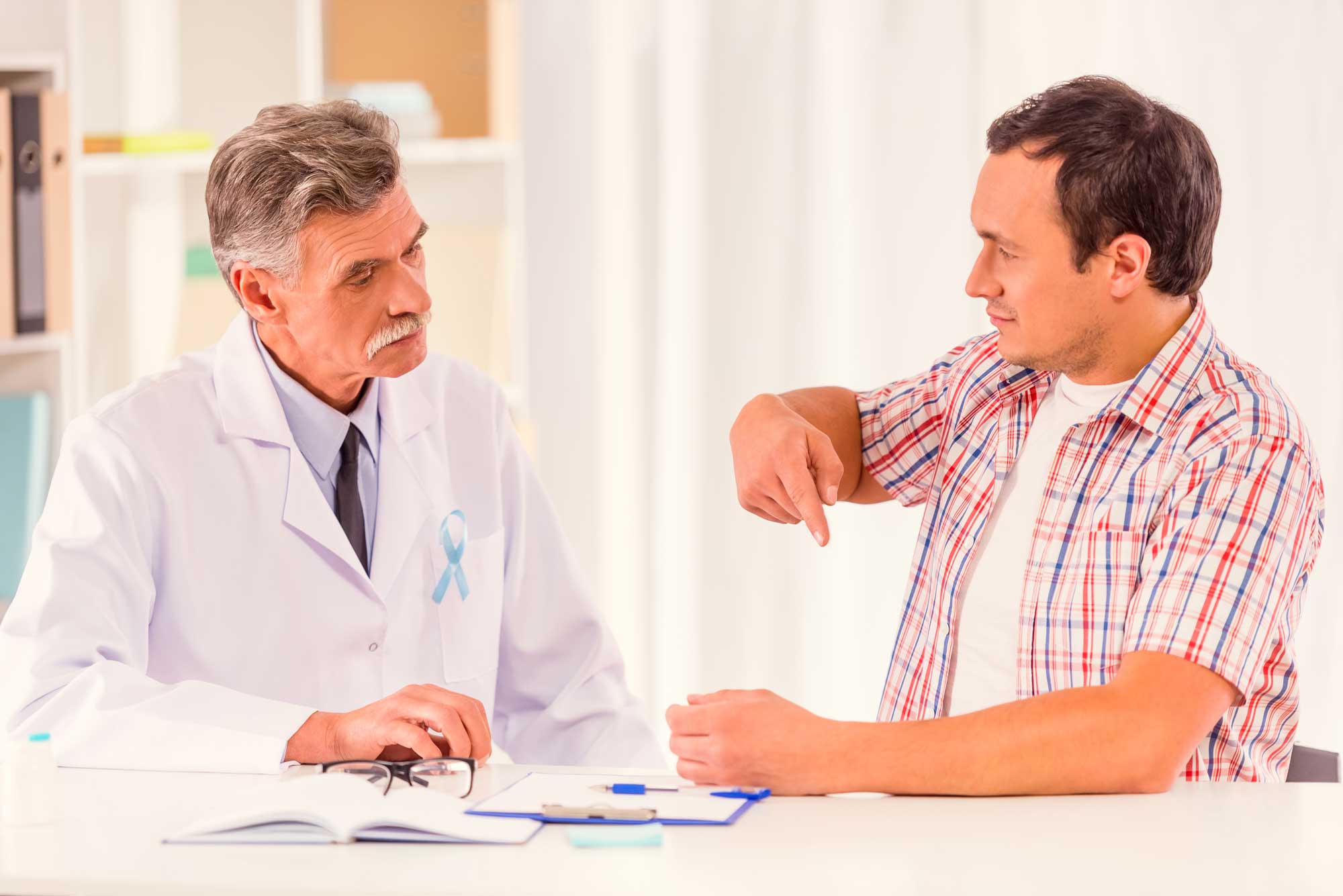 patient explaining issue to doctor
